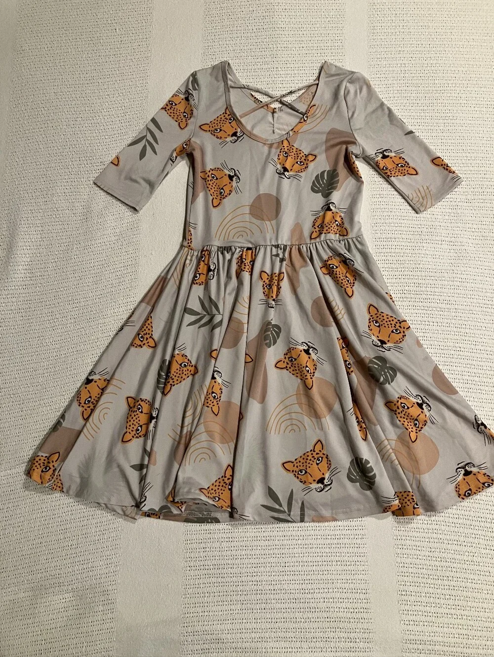 $4 If Bundled. Girls' Leopard Print Twirl Dress